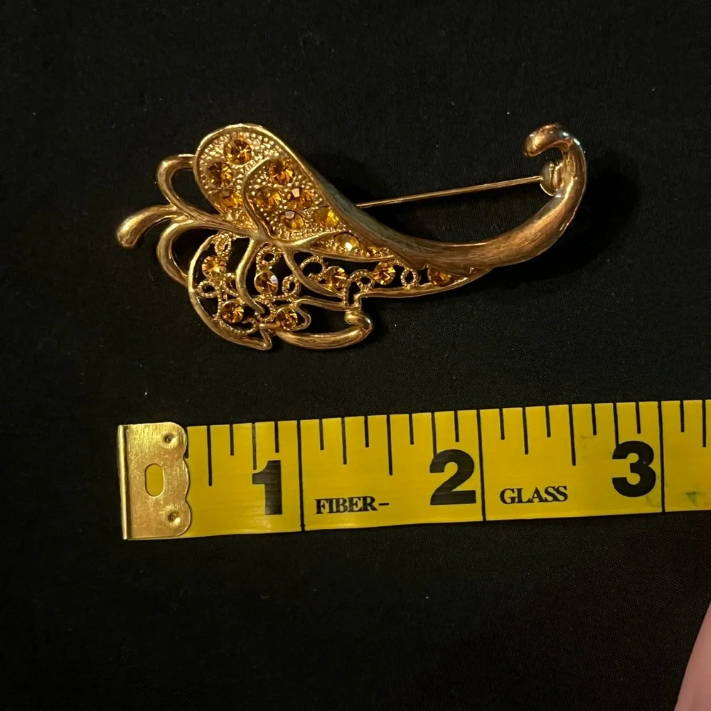 Abstract Gold Tone Leaf Brooch with Orange Rhinestones